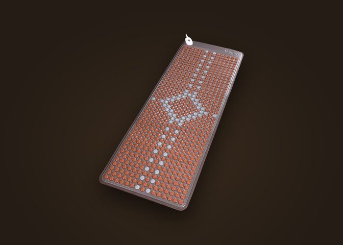 T11 mat laid out on an armchair