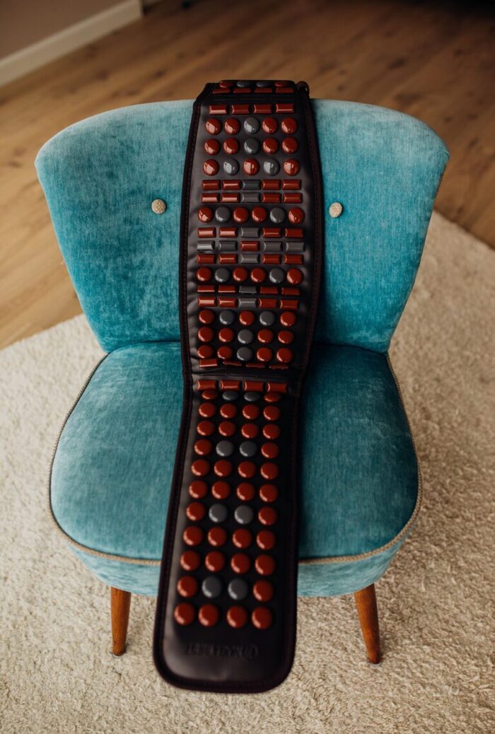 T9 heating belt on an armchair